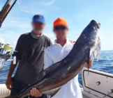 A Pair Of Sport Fishermen Showing Off Their Cobia Catchphoto By: Widttfhttps://Creativecommons.org/Licenses/By-Nd/2.0/